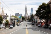 The iconic TransAmerica Building stands at  the end of an empty Columbus Avenue in San Francisco, CA, on March 17, 2020. 
Millions of San Francisco Bay Area  residents were ordered to stay home to slow the spread of the coronavirus as part of a lockdown effort, marking one of the nation's strongest efforts to stem the spread of the deadly virus.