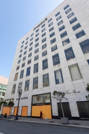 An pedestrian walks her dog by the Macy's store in San Francisco on March 31, 2020 . Macy's is furloughing a majority of its 125,000 employees because of the ongoing coronavirus pandemic, which has sunk sales and forced it close to its stores.
Millions of San Francisco Bay Area  residents were ordered to stay home for the third week to slow the spread of the coronavirus as part of a lockdown effort.