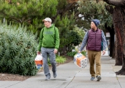 San Francisco residents returning from a convenience store with toilet paper in San Francisco, CA on Mach 18 , 2020. Toilet paper has been the main staple to fly off the shelves since the coronavirus crisis. Millions of San Francisco Bay Area  residents were ordered to stay home to slow the spread of the coronavirus as part of a lockdown effort, marking one of the nation\'s strongest efforts to stem the spread of the deadly virus.