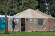 Sick people  at a first-of-its-kind COVID-19 testing center in Hayward, CA, on March 23, 2020.   The free test facility opened to  to the public this morning regardless of where the patients live or their immigration status. The entire state of California is on a shelter-in-place status ordered by the governor to slow the spread of the COVID-19 disease.