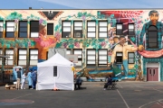 A man wearing a mask waits for his turn to be tested inside a school in the heavily Latino Mission District of San Francisco, CA, on April 25, 2020. Doctors and volunteers set up pop-up testing centers in this district to test for coronavirus and antibodies all 5,700 residents for free  in one census tract in hopes the data collected will help explain why Latinos and African Americans have been dying at disproportionate rates from COVID-19.