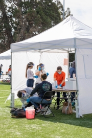 A health worker draws blood from a woman at a testing center  in the heavily Latino Mission District of San Francisco, CA, on April 25, 2020. Doctors and volunteers set up pop-up testing centers in this district  to test for coronavirus and antibodies all 5,700 residents for free  in one census tract in hopes the data collected will help explain why Latinos and African Americans have been dying at disproportionate rates from COVID-19.