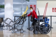 An airport employee with a mask and gloves pushes wheelchairs through the empty terminal the San Francisco International airport on April 8, 2020.
The COVID-19 pandemic has reduced air traffic tremendously.