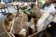 Bags of food at the Alameda Food Bank distribution center in Alameda, CA, on April 15, 2019. The food was distributed later through a drive-through to people in need following the loss of their jobs due to the “shelter-in-place” order to limit the spread of the coronavirus SARS-CoV-2.