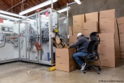 A blind worker at the end of the production line of  toilet paper packets at the Sirkin Center in San Leandro, CA, on May 11, 2020.