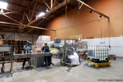 The production line of cleaning products at the Sirkin Center in San Leandro, CA, on May 11, 2020. The fence worker on the right is blind.