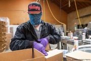 A blind worker at the production line of cleaning products at the Sirkin Center in San Leandro, CA, on May 11, 2020.