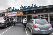 Waiters or carhops taking orders from customers in their cars  at the Mel’s  Drive-In restaurant in San Francisco, CA, on May 12, 2020.Like in the 1950’s, Mel's Drive-In restaurant in San Francisco is now offering carhop service so customers stay safe while still feeling like they get the experience of eating out during the shelter-in-place order due to the coronavirus pandemic.