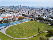 People lay on the grass inside circles drawn to encourage  social distancing at Dolores Park in San Francisco, CA, on  May 21, 2020. This effort marks the city’s latest effort to get back to some sort of normalcy following the long shelter-in-place order while trying to keep the risks of infection from the coronavirus to the minimum.