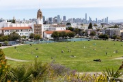 People lay on the grass inside circles drawn to encourage  social distancing at Dolores Park in San Francisco, CA, on  May 21, 2020. This effort marks the city’s latest effort to get back to some sort of normalcy following the long shelter-in-place order while trying to keep the risks of infection from the coronavirus to the minimum.