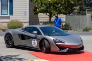 Owners of exotic cars gather at an event in Petaluma, CA, on June 27, 2020, while trying to respect social distancing rules due the ongoing COVID-19 pandemic. The event, held at the Adobe Road Wines winery , was organized by 100|OCT, an exotic car community on the US West Coast  founded by Frenchman Benoit Boningue. The event marked the final destination of a day ride through the region.