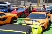 A number of exotic cars parked at an event in Petaluma, CA, on June 27, 2020, while trying to respect social distancing rules due the ongoing COVID-19 pandemic. The event, held at the Adobe Road Wines winery , was organized by 100|OCT, an exotic car community on the US West Coast  founded by Frenchman Benoit Boningue. The event marked the final destination of a day ride through the region.